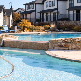 Resort-style pool with lounging area